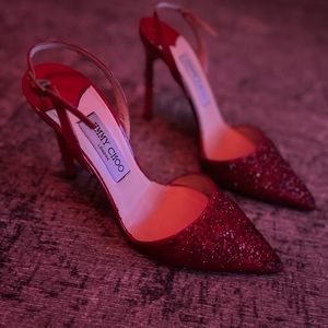 Red sparkly Jimmy Choo slingbacks.